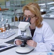 mesothelioma scientist in white lab coat