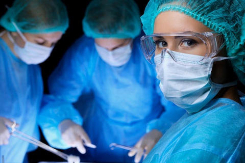 surgeons using gel-based mesothelioma treatment